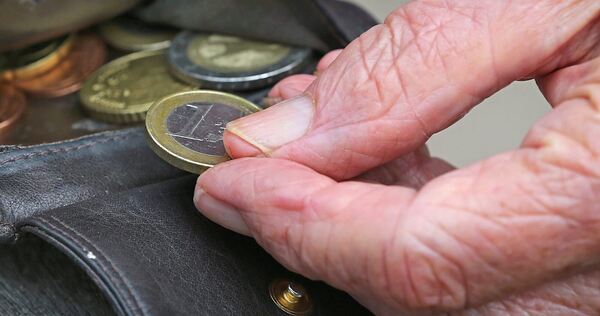 Verschiedene Münzen in einem Geldbeutel. Verschiedene Münzen in einem Geldbeutel.